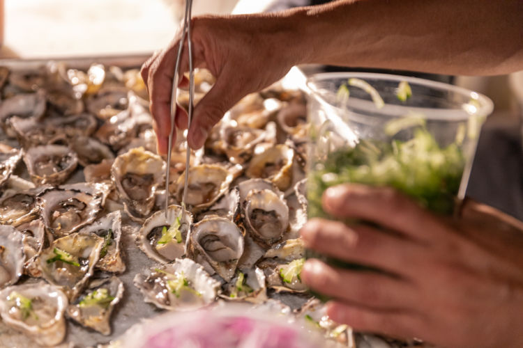 Oysters getting prepped for the Savore Hermes Event.