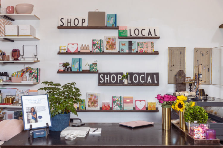 Gifted LA shop wall that features creative pieces and words that say Shop Local.